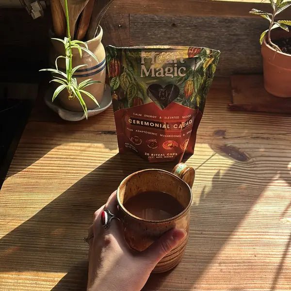 A hand around a mug of cacao in morning sun, from Jeannie J.'s review