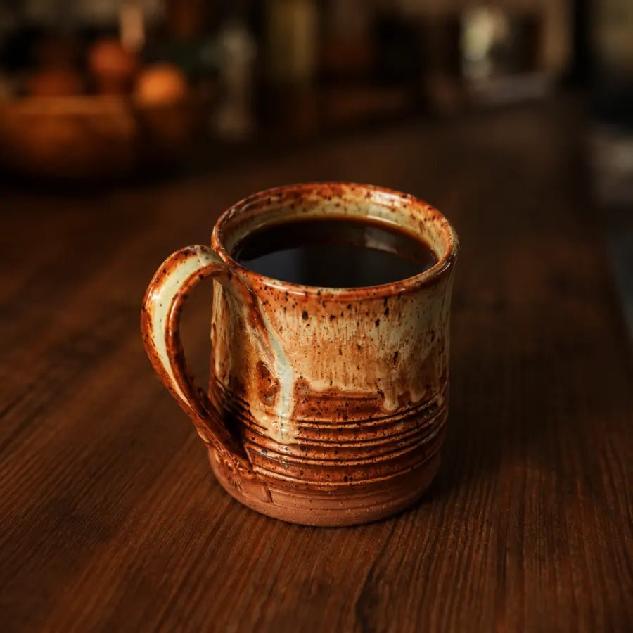 A mug of thin black coffee